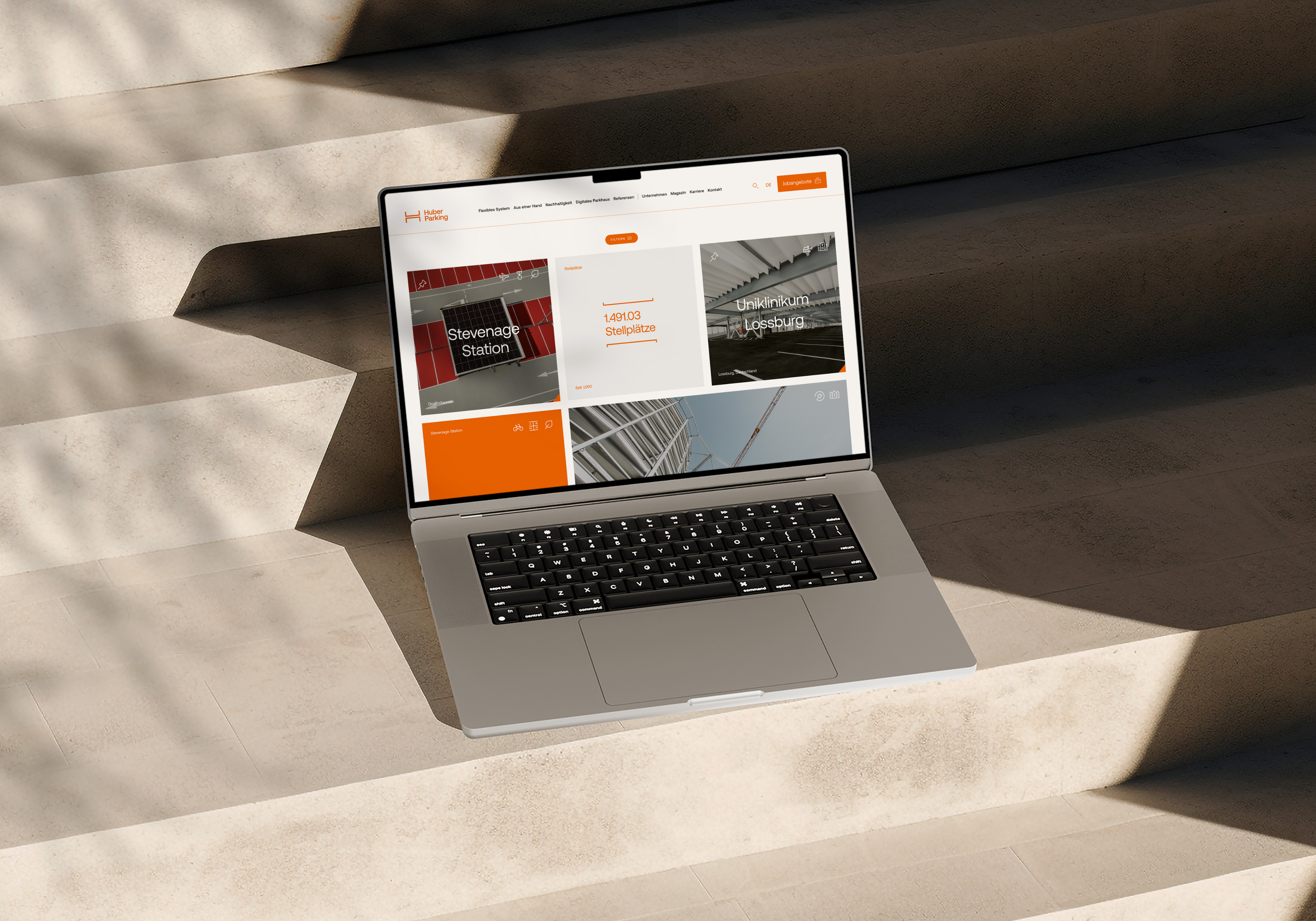 Graphic of a close up of a website depicting an Our Projects page with sample project names and dates.